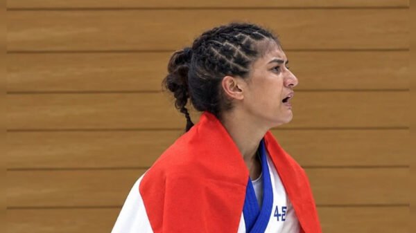 InShot 20260922 161814076 Suchika Tariyal Misses Asian Games MMA Final After 700-Gram Weight Tiebreaker India’s Suchika Tariyal secured a historic bronze medal in women’s traditional 60kg mixed martial arts at the 2026 Asian Games in Nagoya, Japan, but her semifinal exit came after a closely contested bout and a controversial weight-based tiebreaker.